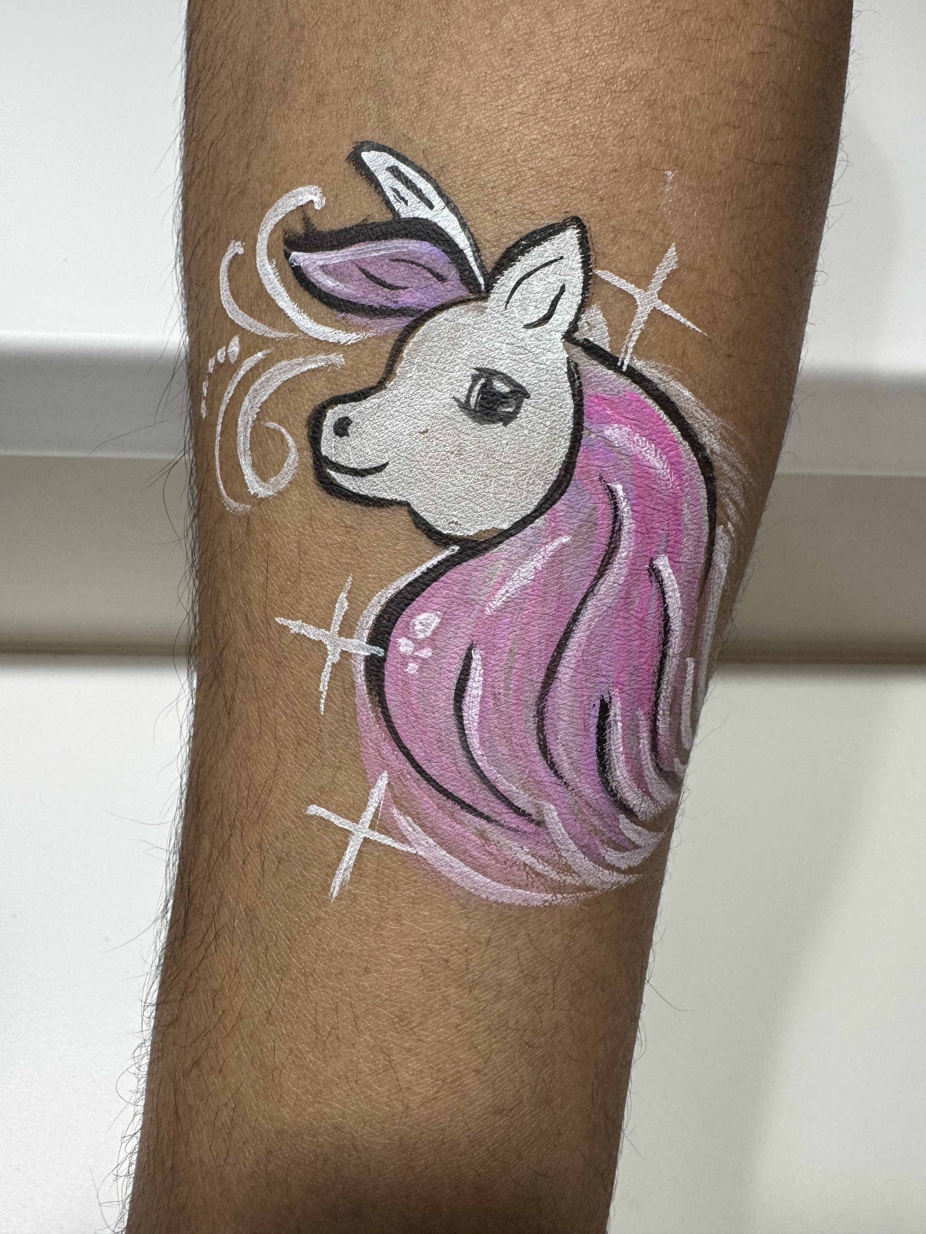 Cute pastel unicorn with bold outlines and sparkly details